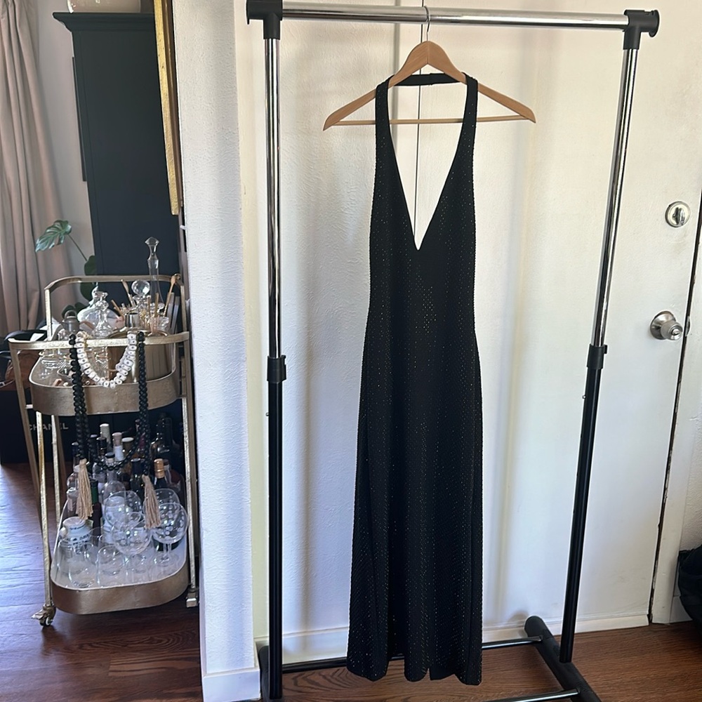 Black beeded halter dress.